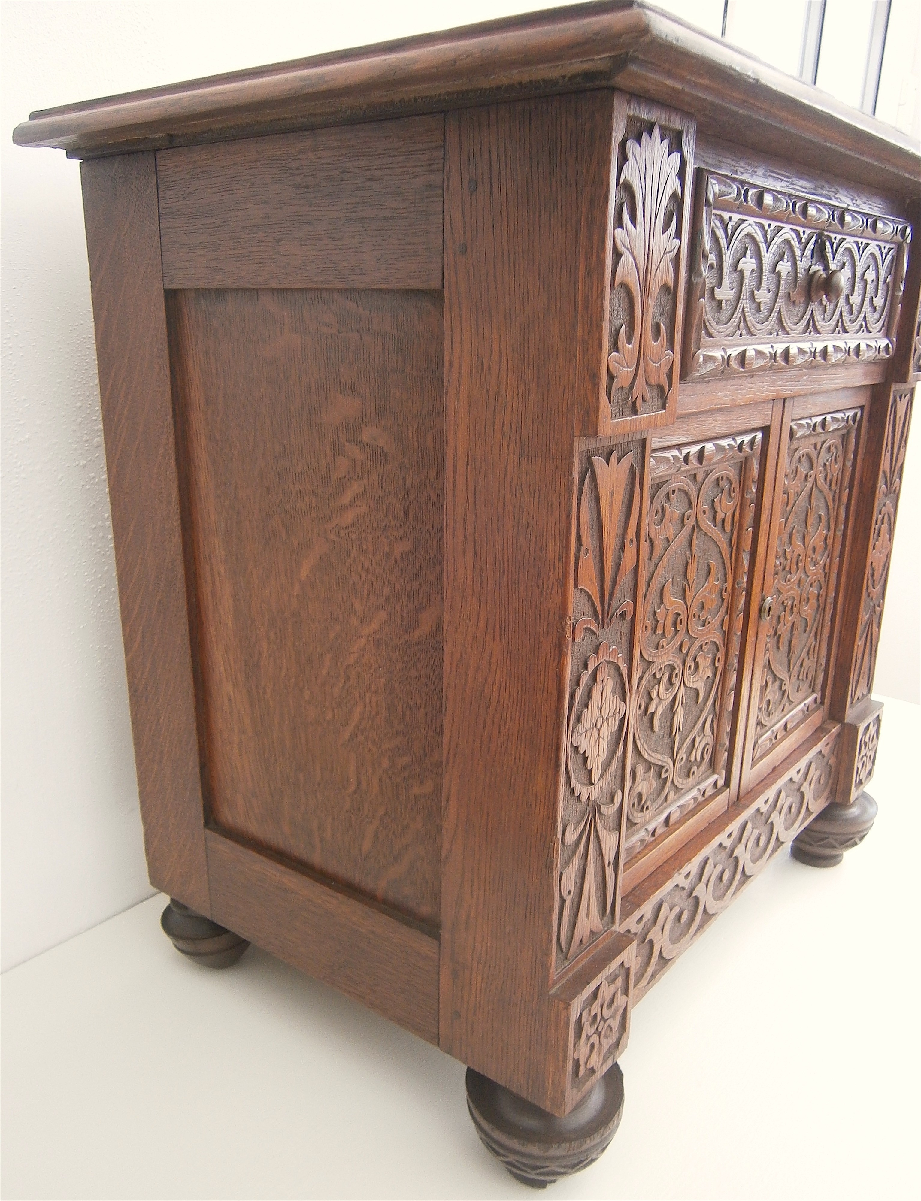 A Victorian carved oak table top collector's cabinet, width 58cm, depth 37cm, height 56cm